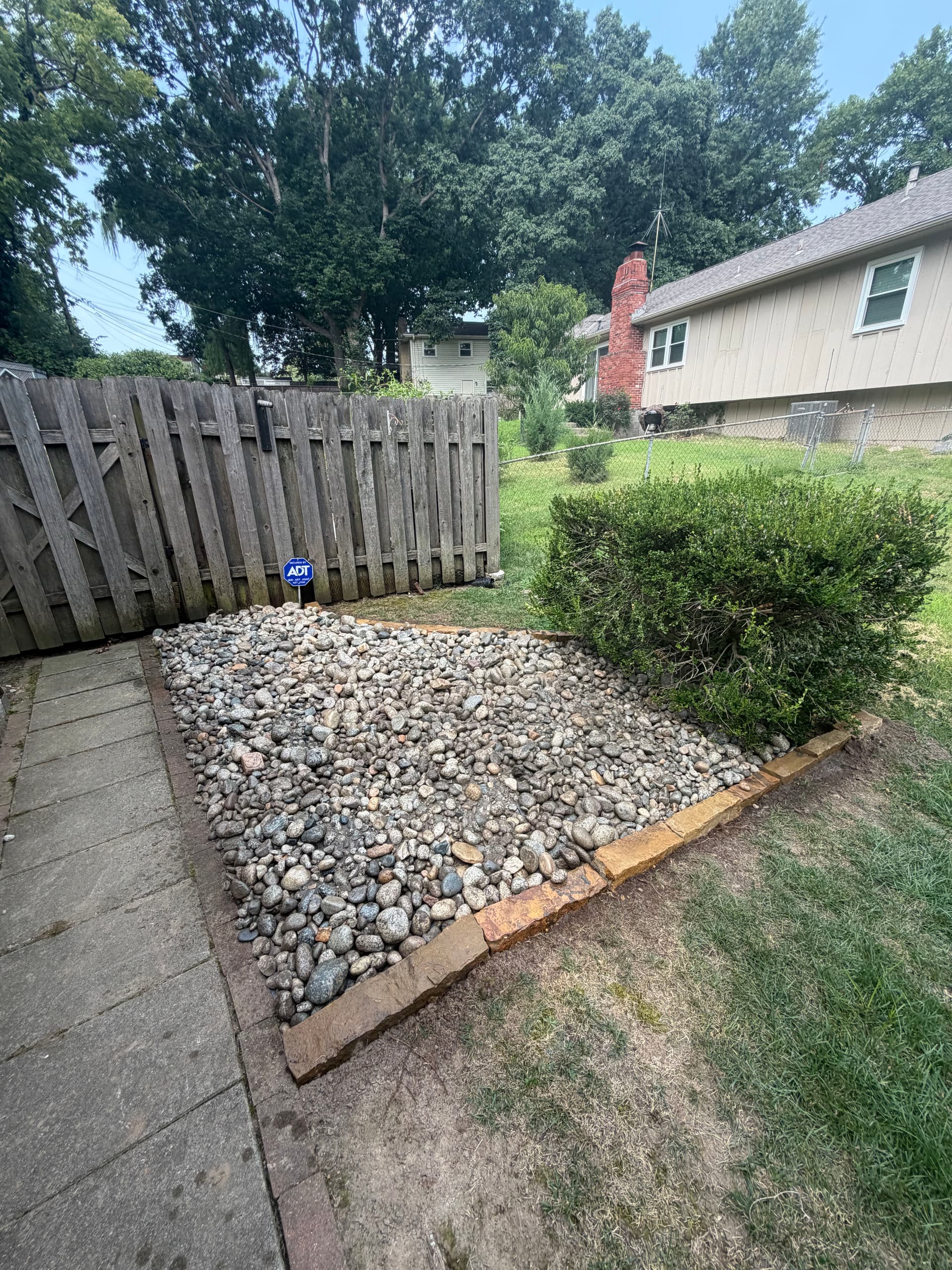 Gallery photos for Rock Bed Installation Fixes Patchy Lawn Areas in Gladstone Missouri: Image #2