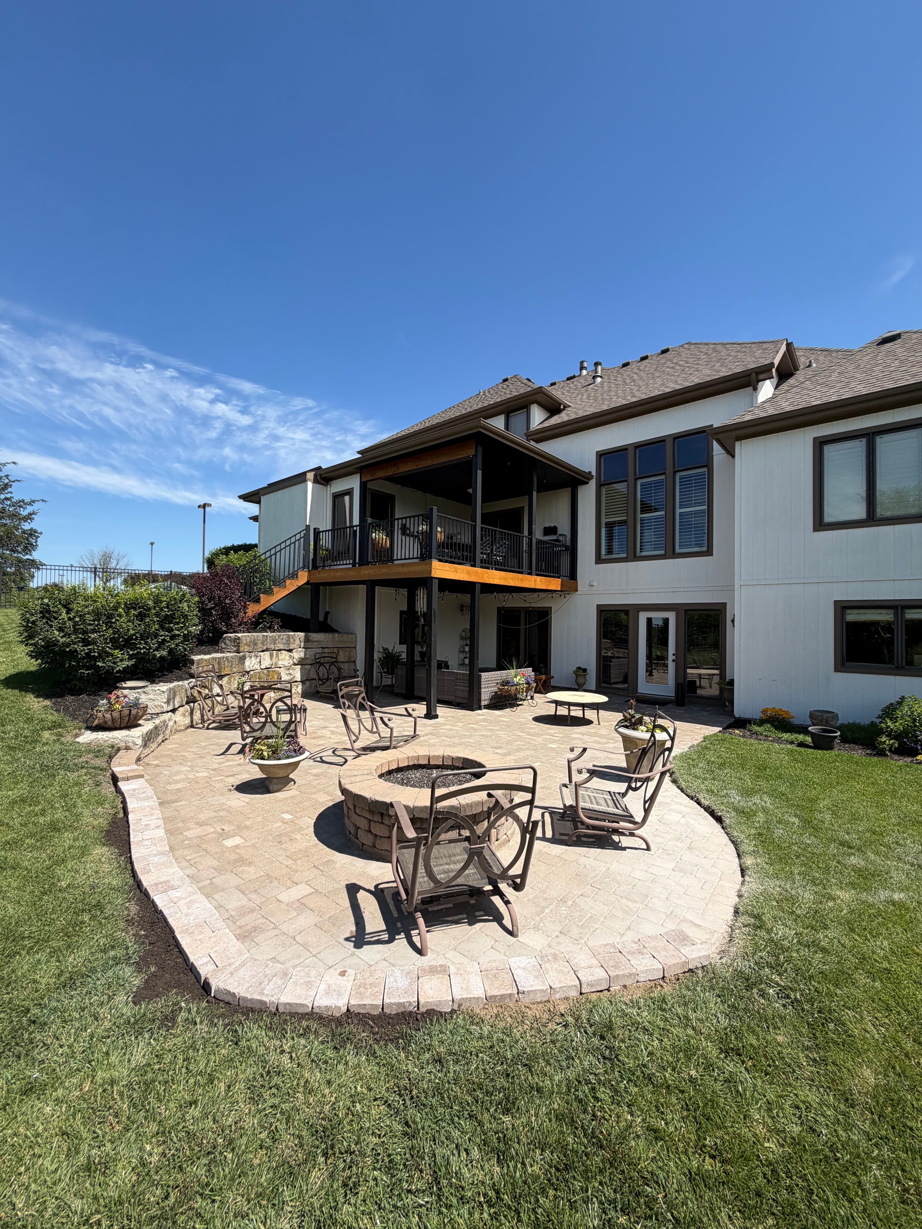 Project Paver Patio Reset With Drainage Fix and Retaining Wall image