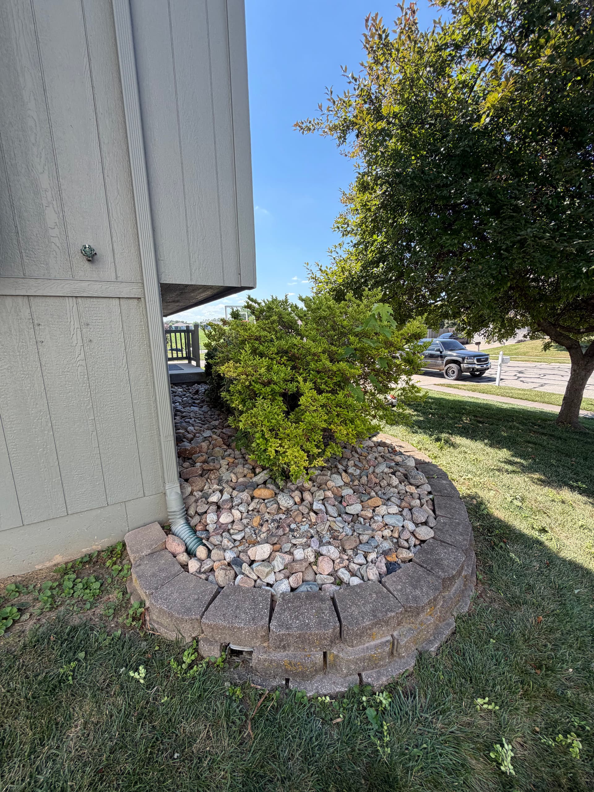 Gallery photos for Rock Bed Cleanup and Bush Removal in Smithville MO: Image #2