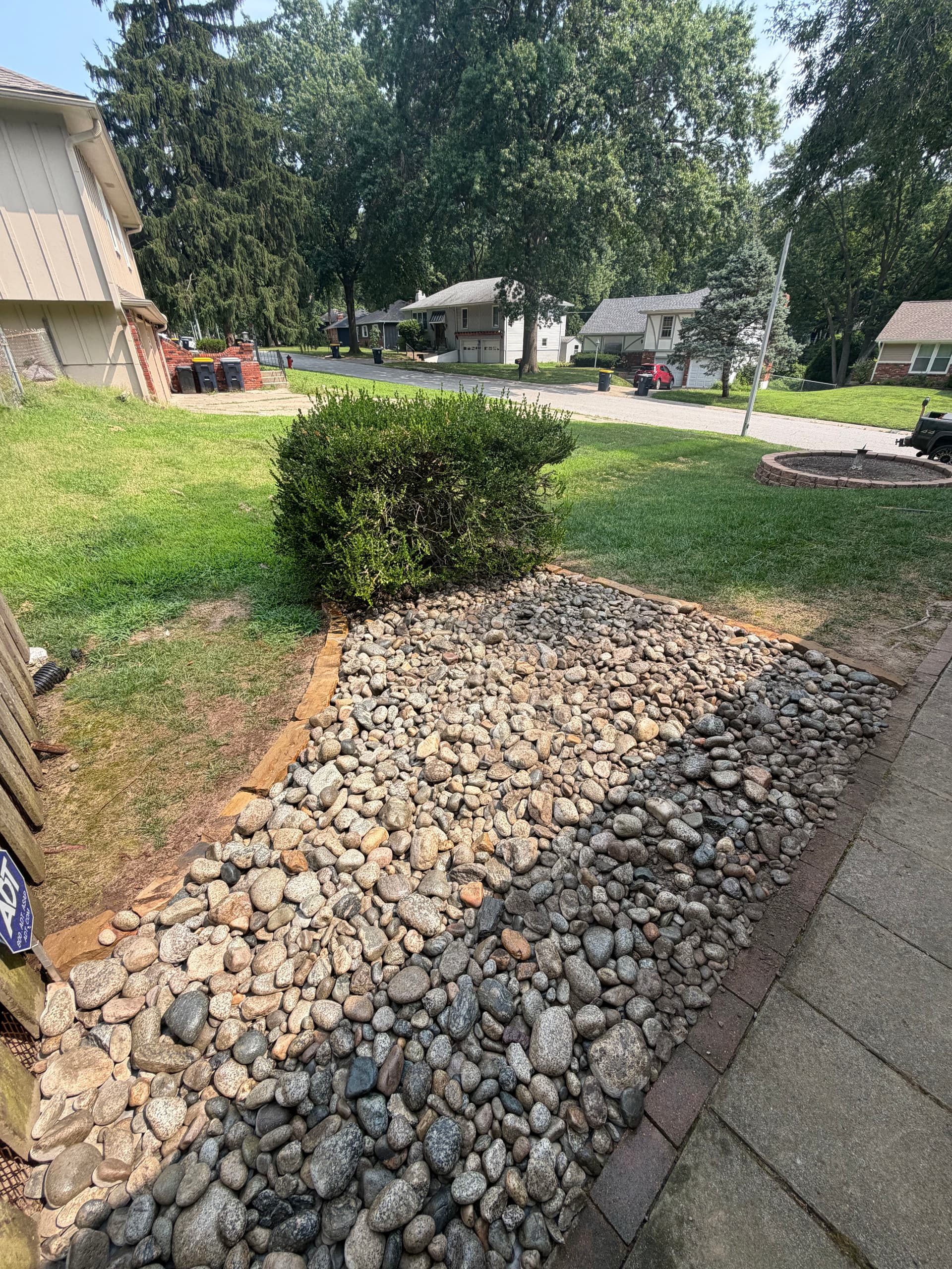 Gallery photos for Rock Bed Installation Fixes Patchy Lawn Areas in Gladstone Missouri: Image #3