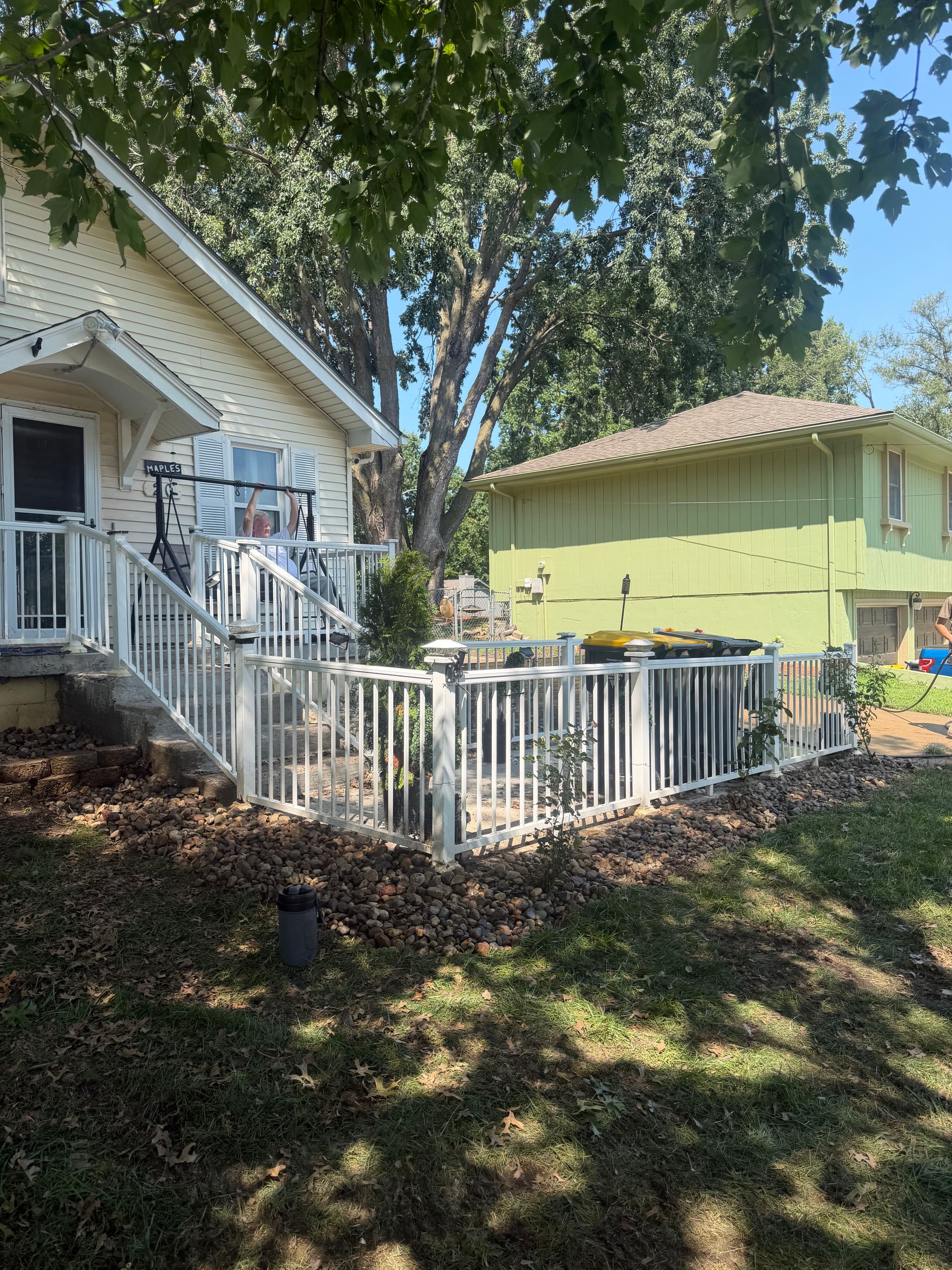 Rock Bed Cleanup and Landscape Refresh Around the Whole Home image