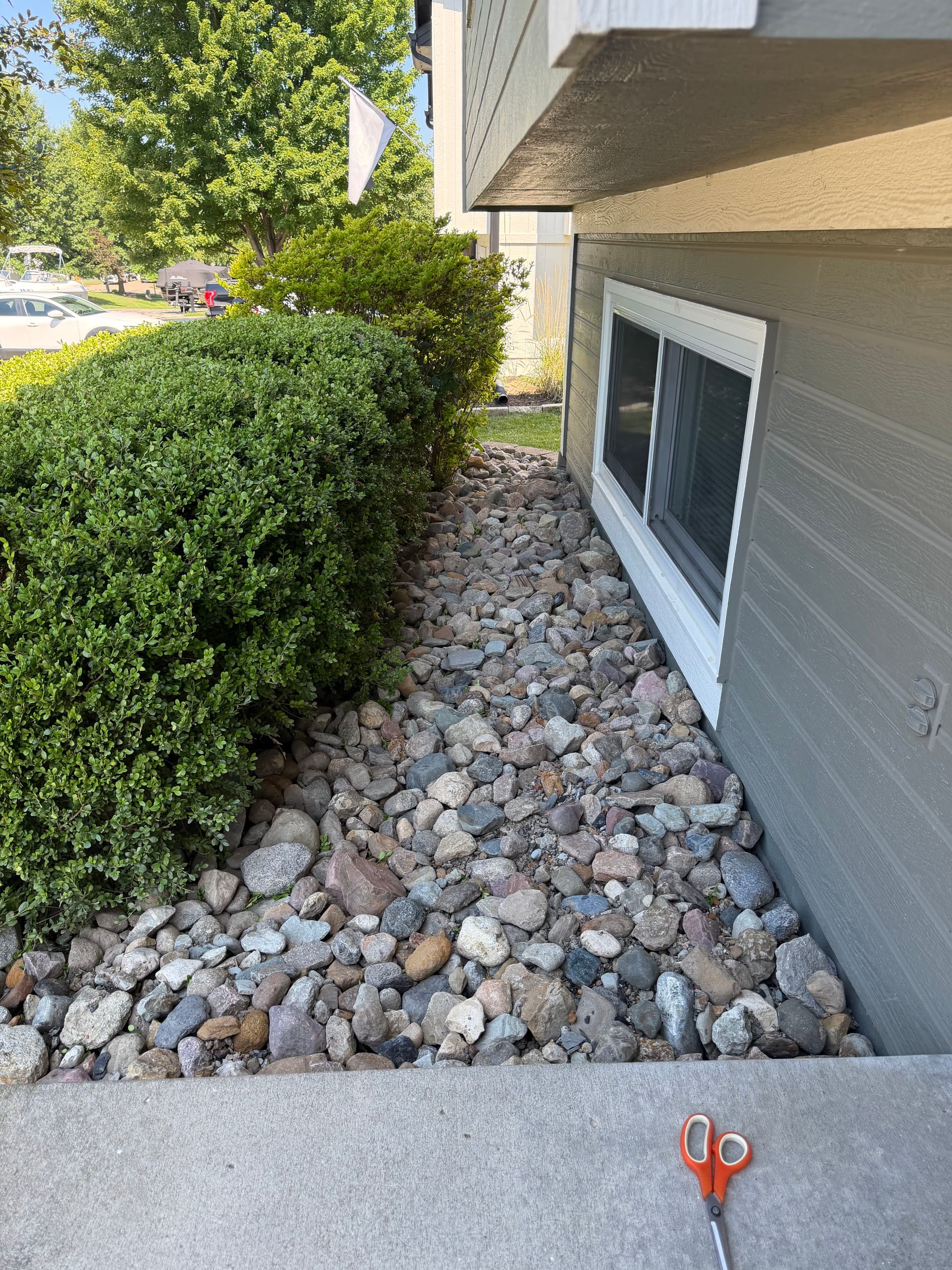 Gallery photos for Rock Bed Cleanup and Bush Removal in Smithville MO: Image #3