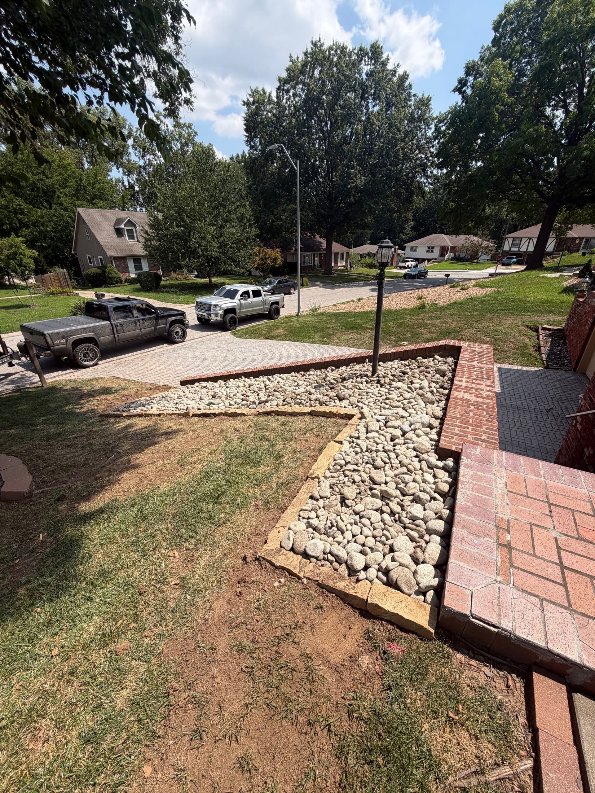 Gallery photos for Rock Bed Installation Fixes Patchy Lawn Areas in Gladstone Missouri: Image #1
