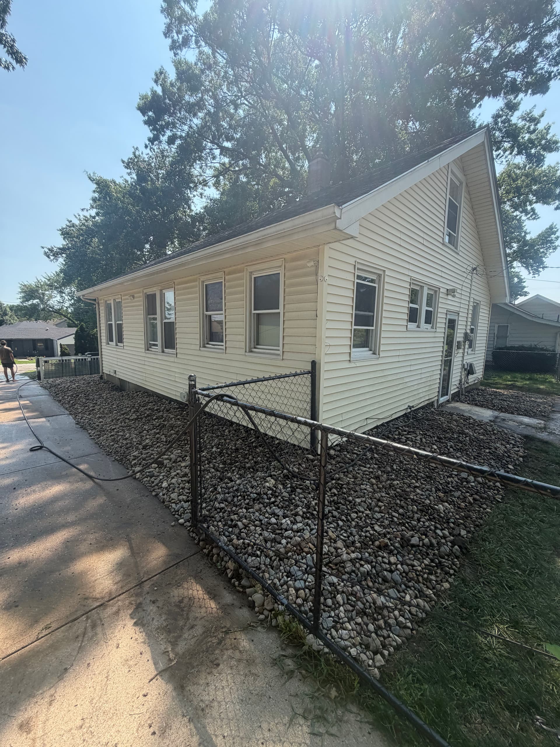 Gallery photos for Rock Bed Cleanup and Landscape Refresh Around the Whole Home: Image #3