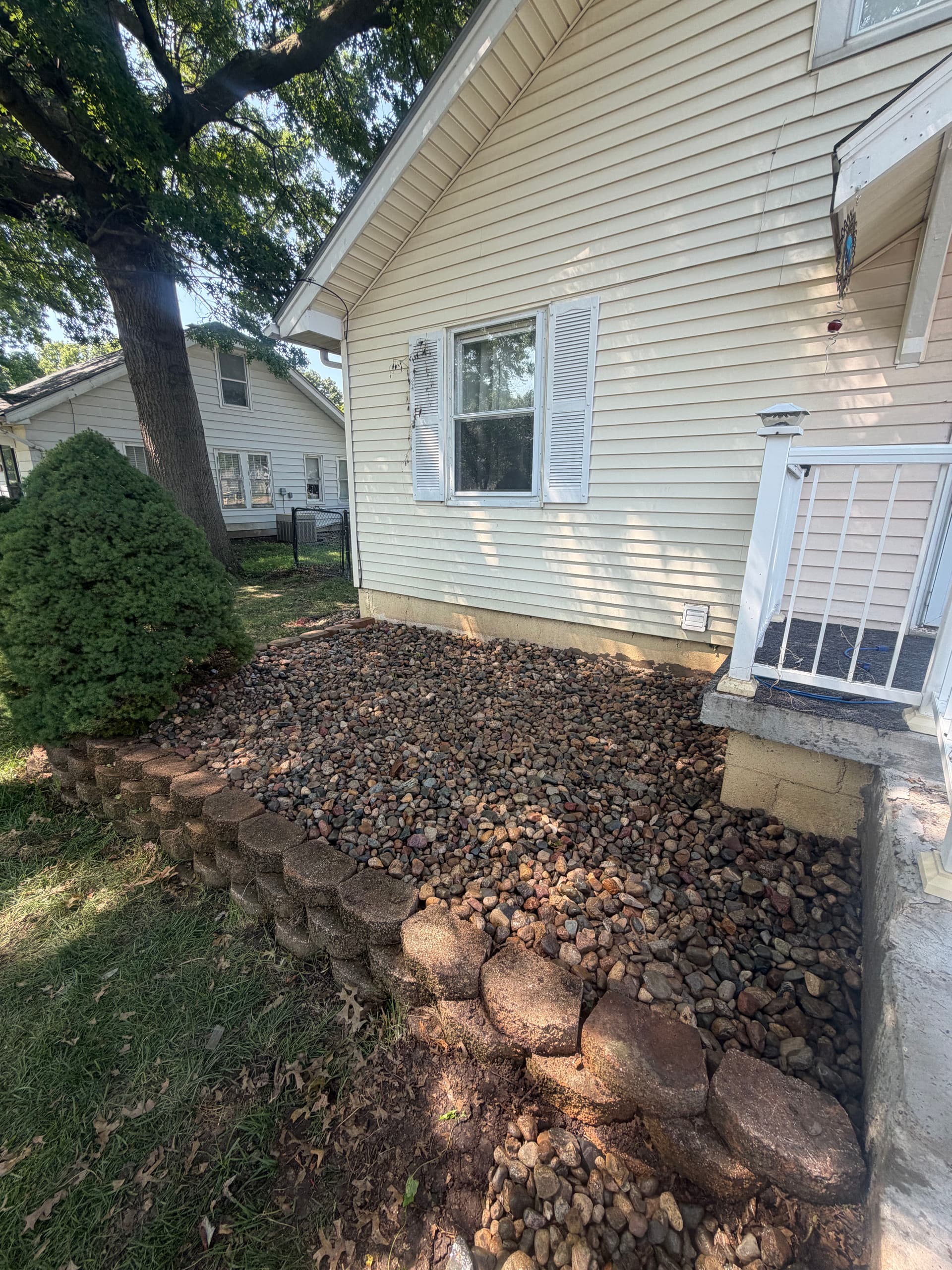 Gallery photos for Rock Bed Cleanup and Landscape Refresh Around the Whole Home: Image #1