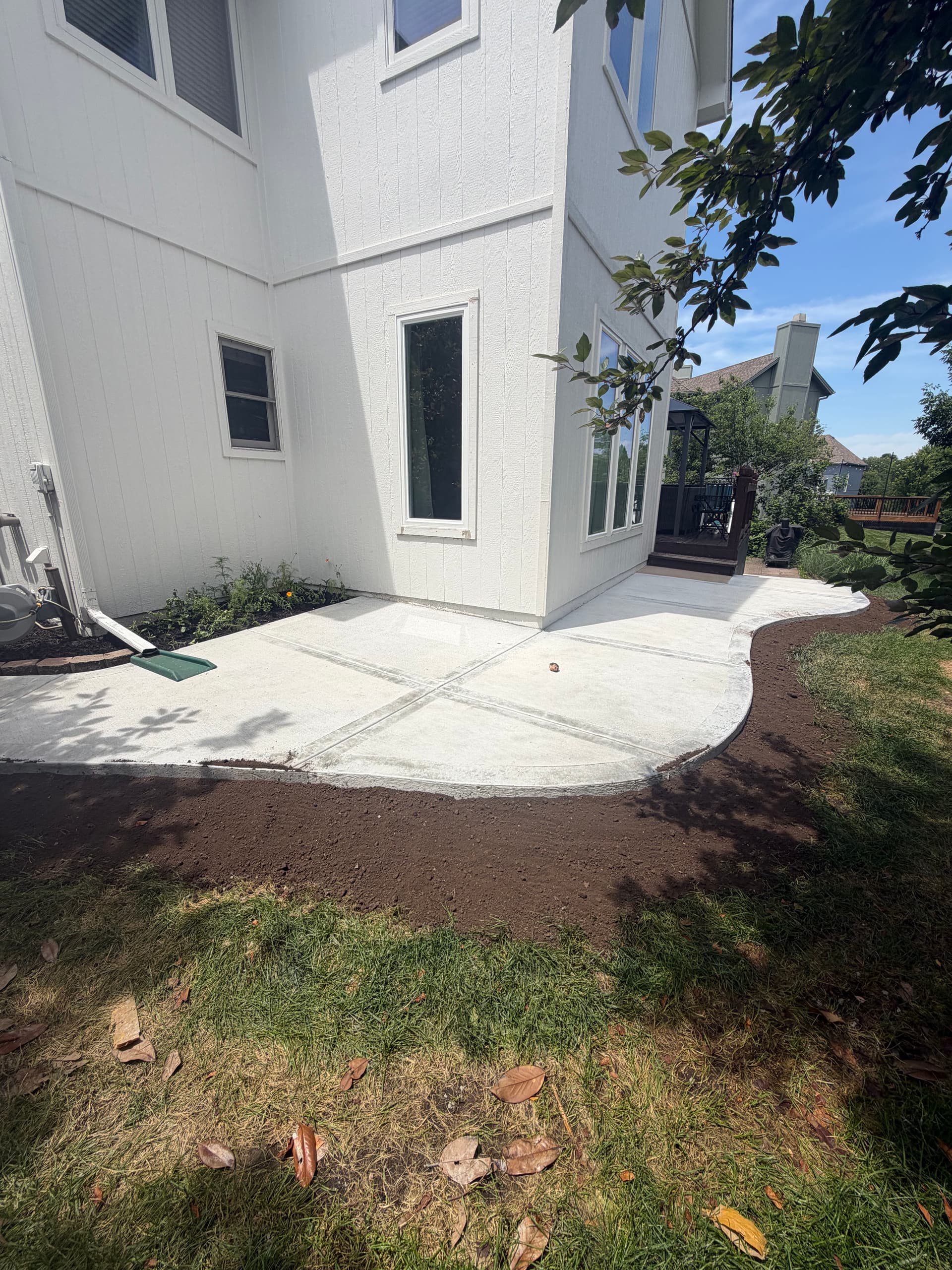 New Concrete Patio and Backyard Sidewalk in Kansas City image