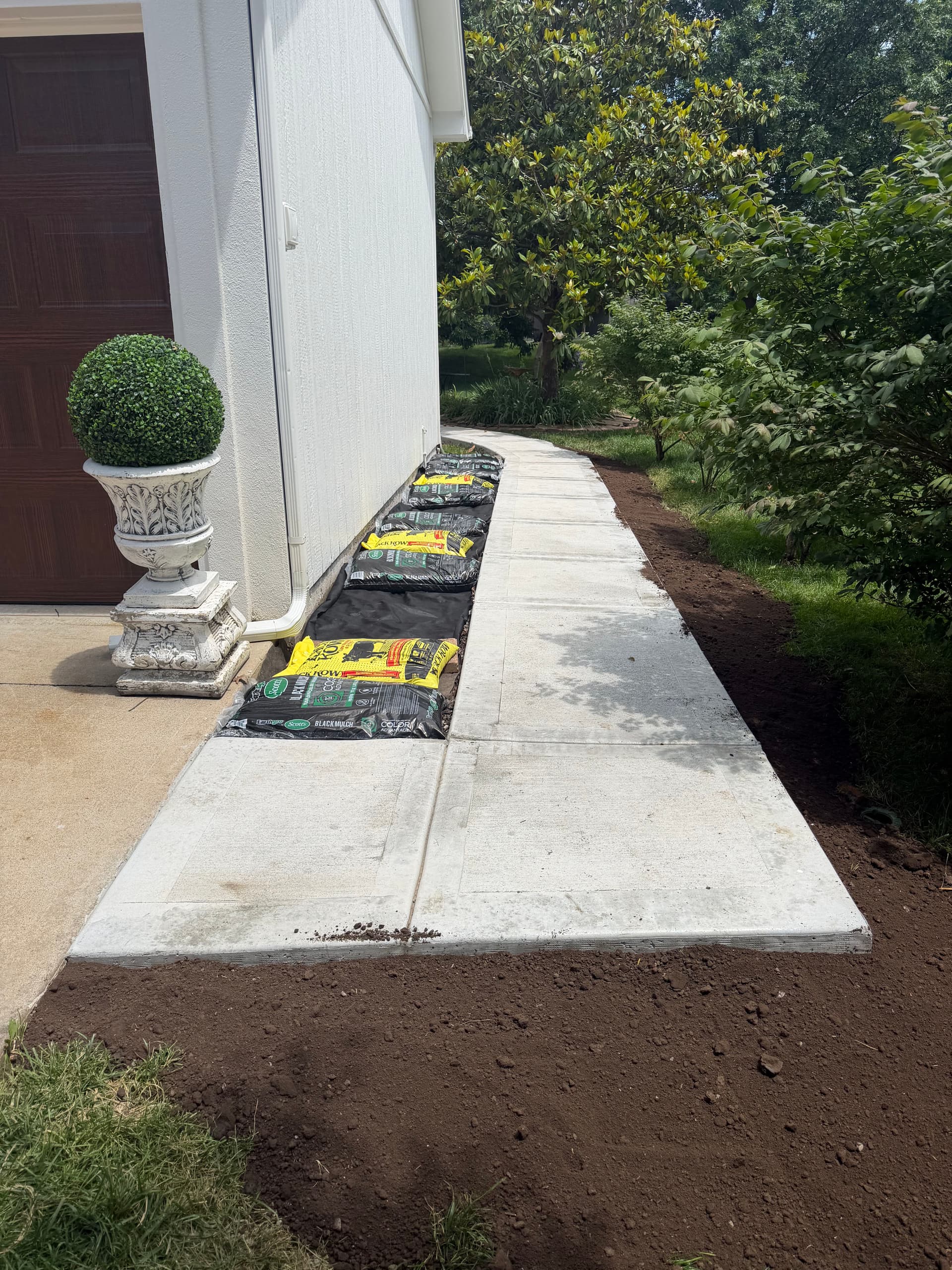 Gallery photos for New Concrete Patio and Backyard Sidewalk in Kansas City: Image #3