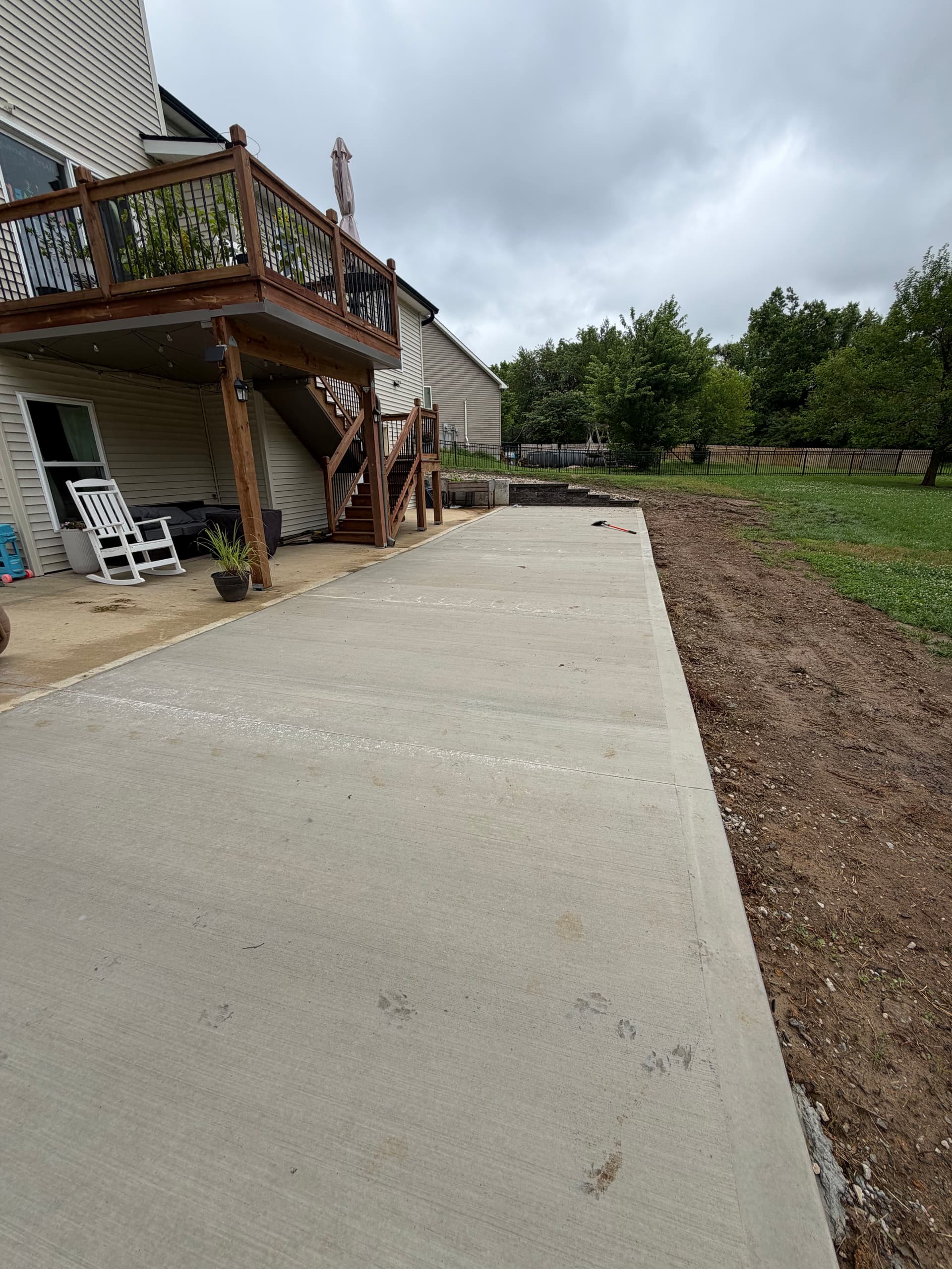 Gallery photos for Patio Extension with Retaining Wall and Rock Bed in Platte City: Image #3